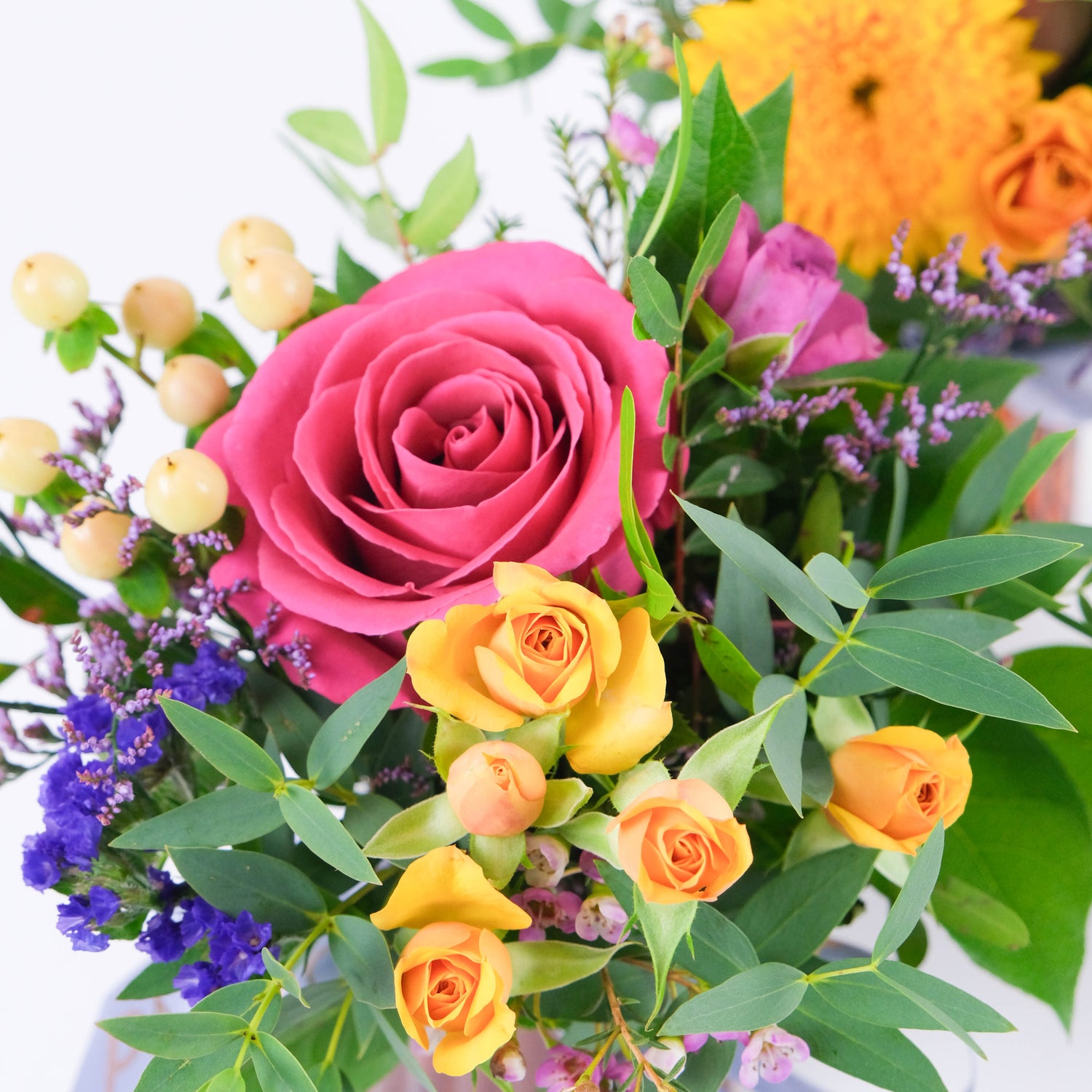 Fleurs dans un vase au choix du fleuriste