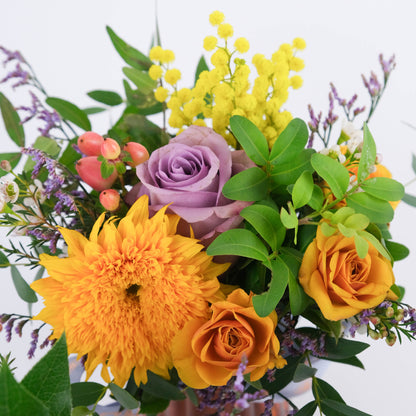 Fleurs dans un vase au choix du fleuriste